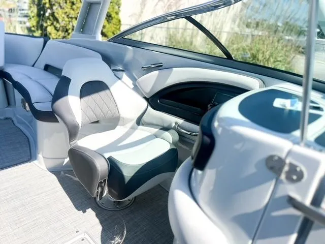 Slide: The Image of 2025 Crownline 290 XSS boat interior with modern seating and sleek design. - 21
