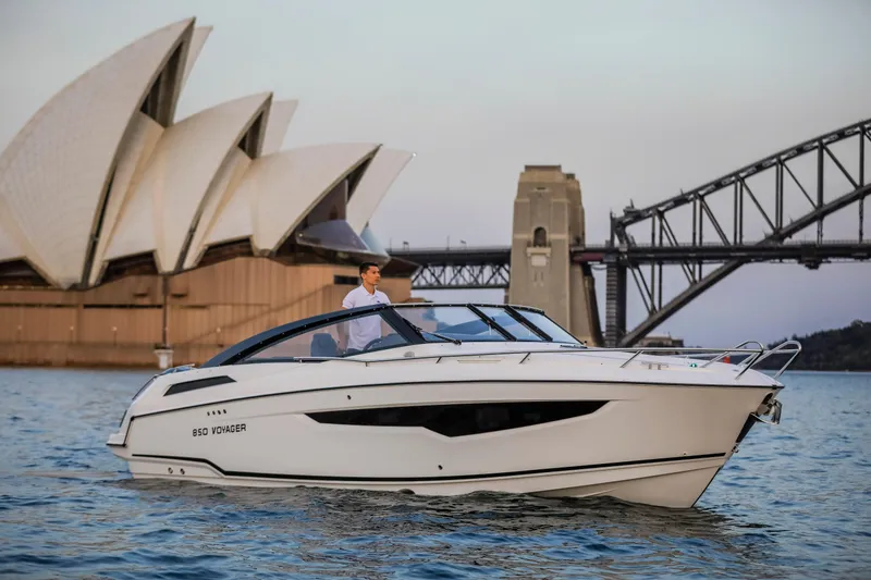 Slide: The Image of 2024 Skamander 850 Voyager boat near Sydney Opera House and Harbour Bridge. - 10
