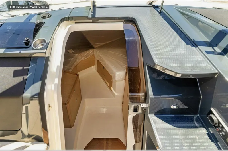 Slide: The Image of 2024 Skamander 850 Voyager yacht interior with modern design and sleek finishes. - 30