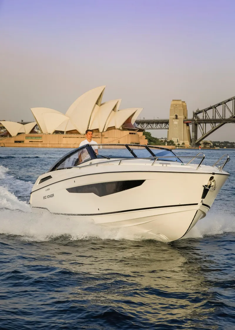 Slide: The Image of 2024 Skamander 850 Voyager cruising near Sydney Opera House and Harbour Bridge. - 9