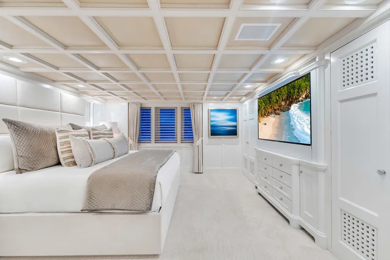 Slide: The Image of Luxurious 1998 Admiral Pilothouse yacht interior with elegant white decor and cozy seating area. - 18
