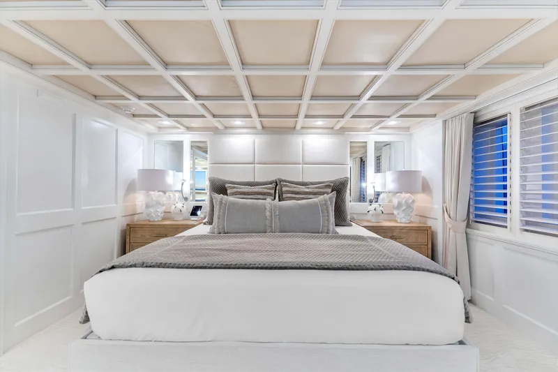 Slide: The Image of Luxurious Admiral Pilothouse 1998 bedroom with elegant white decor and large TV. - 20