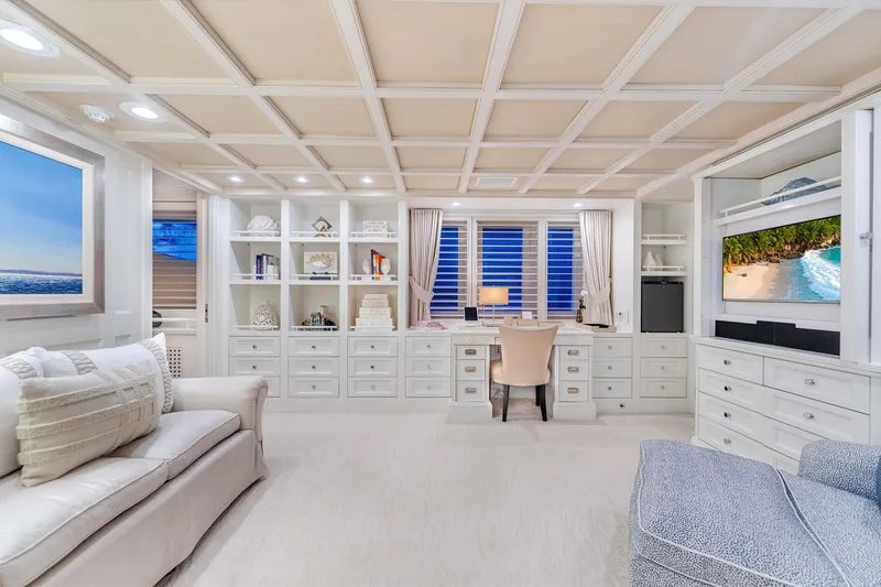 Slide: The Image of Luxurious Admiral Pilothouse 1998 bedroom with elegant decor, large TV, and serene ambiance. - 22