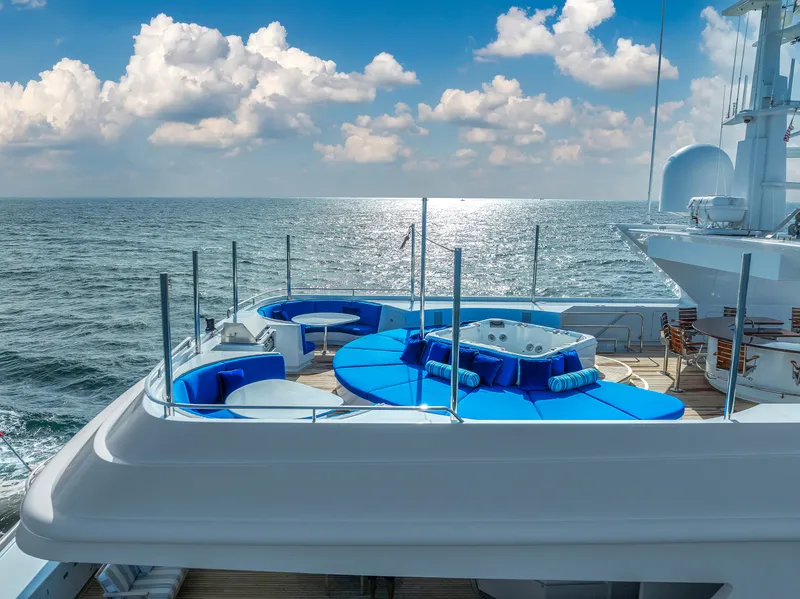 Slide: The Image of Aerial view of 1998 Admiral Pilothouse yacht cruising through blue ocean waters. - 3