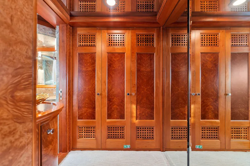 Slide: The Image of Luxurious 1998 Admiral Pilothouse yacht bathroom with marble surfaces and elegant wood accents. - 37