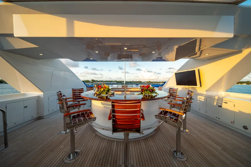 Slide: The Image of Luxurious 1998 Admiral Pilothouse yacht deck with jacuzzi and seating, ocean view. - 6