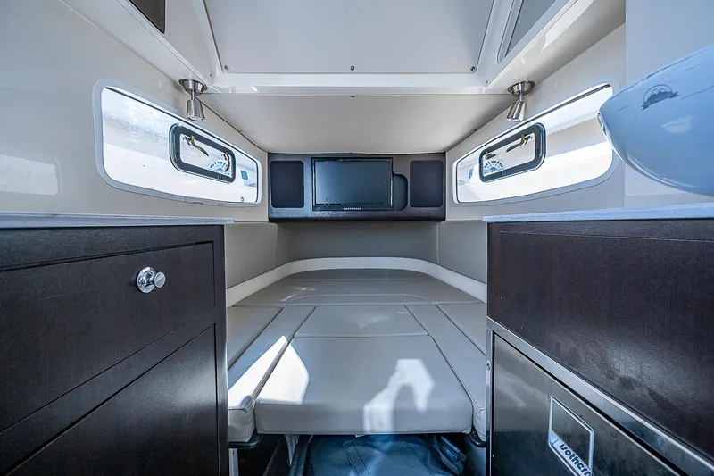 Slide: The Image of 2023 Scout LXF cabin interior with modern design and comfortable seating. - 13