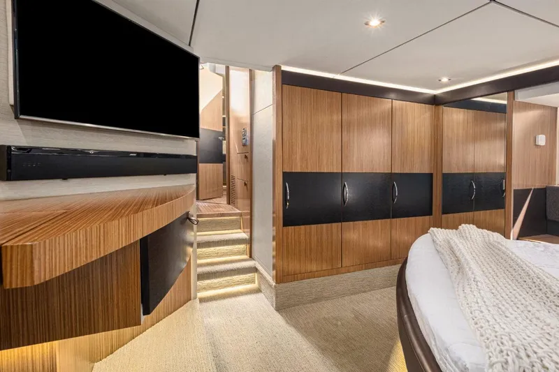 Slide: The Image of Luxurious interior of 2017 Sea Ray L590 Sport yacht with modern wood finishes. - 22