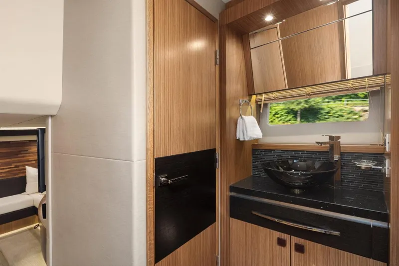 Slide: The Image of Luxurious 2017 Sea Ray L590 Sport yacht interior with modern bathroom design. - 26