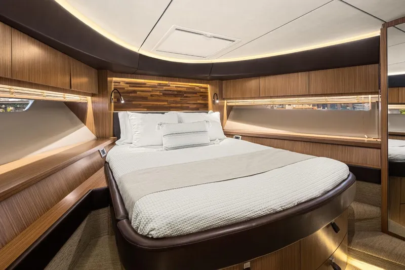 Slide: The Image of Luxurious cabin interior of 2017 Sea Ray L590 Sport yacht with elegant wood finishes. - 28