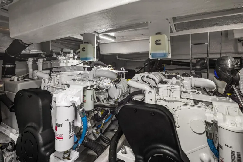 Slide: The Image of Engine room of 2017 Sea Ray L590 Sport yacht, showcasing advanced machinery and components. - 49