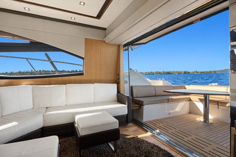 Slide: The Image of Luxurious interior of 2017 Sea Ray L590 Sport yacht with scenic ocean view. - 5