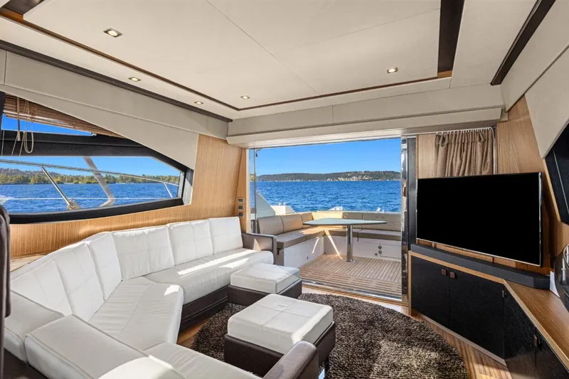Slide: The Image of Luxurious interior of 2017 Sea Ray L590 Sport yacht with scenic ocean view. - 6