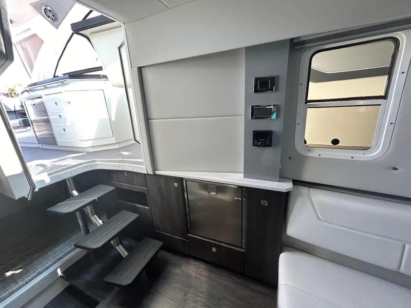 Slide: The Image of 2020 Formula 380 Super Sport Crossover interior with modern design and sleek cabinetry. - 26