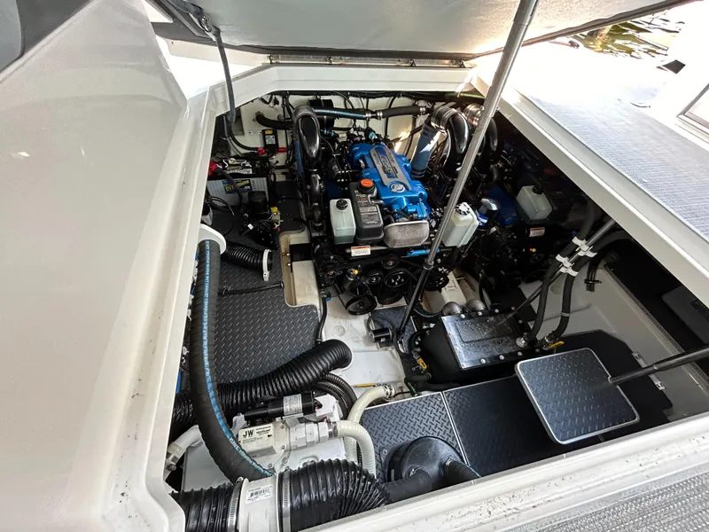 Slide: The Image of Engine compartment of 2020 Formula 380 Super Sport Crossover boat, showcasing detailed mechanics. - 30