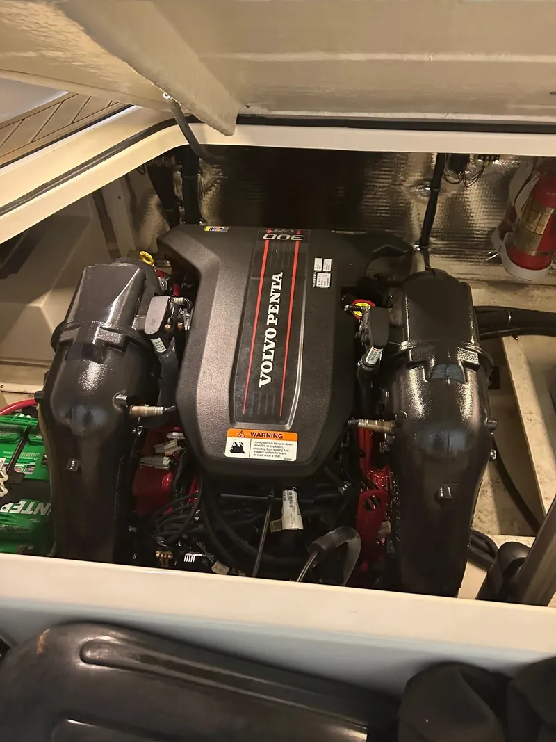 Slide: The Image of 2014 Regal 28 Express engine compartment with Volvo Penta engine. - 4