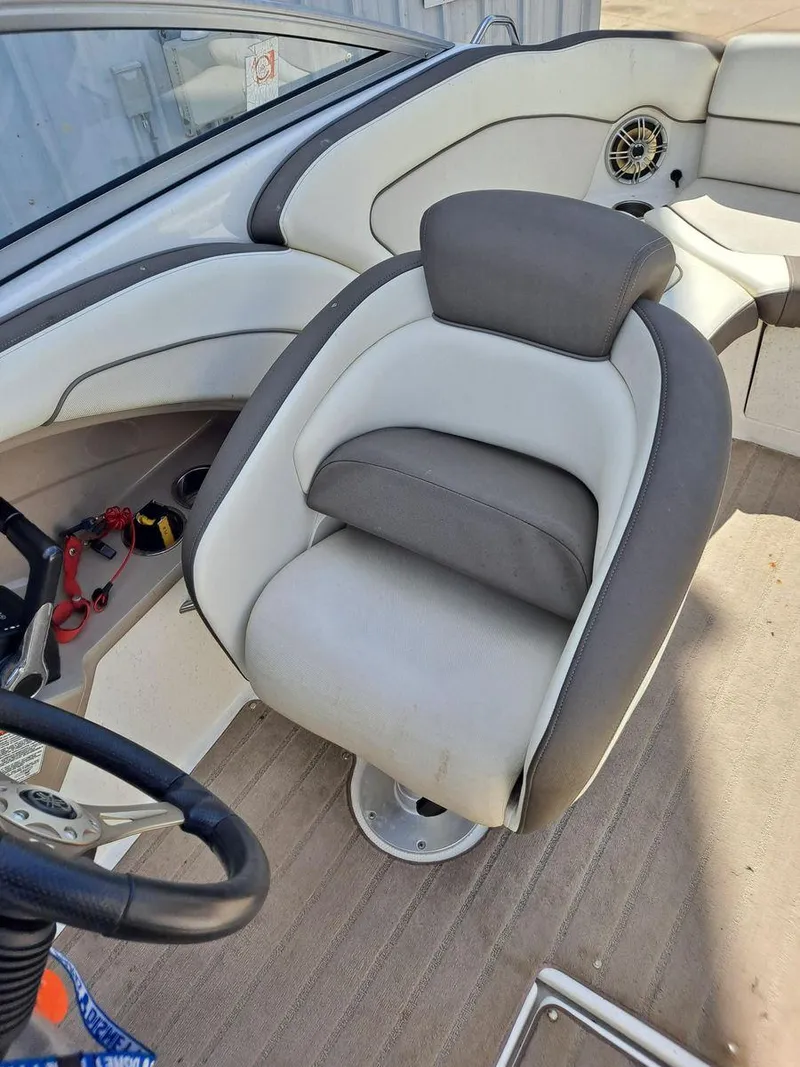 Slide: The Image of 2013 Yamaha Boats 242 Limited S interior with plush seating and modern design. - 15