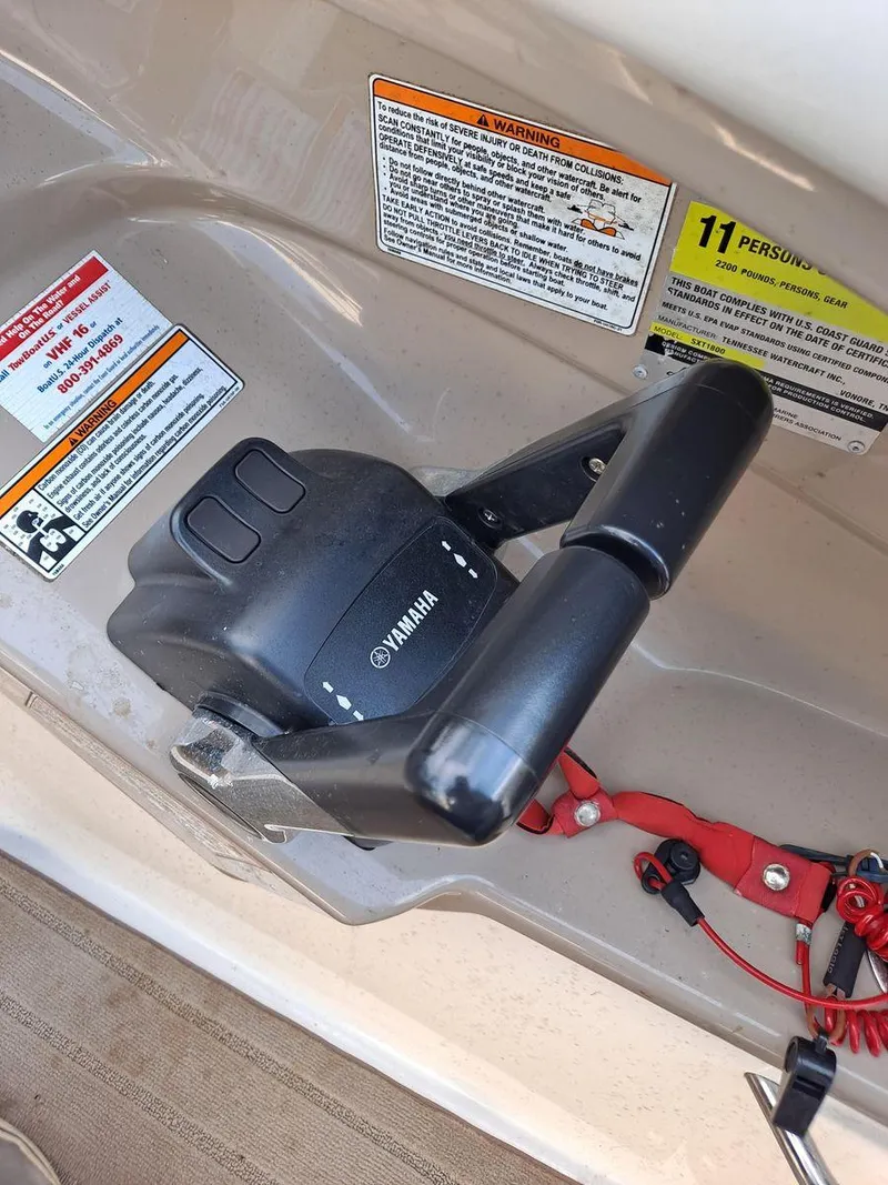 Slide: The Image of Throttle control of 2013 Yamaha Boats 242 Limited S with safety warnings. - 20