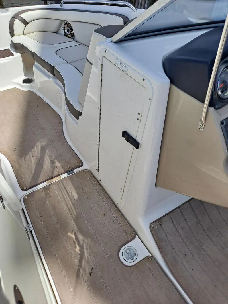 Slide: The Image of Interior view of 2013 Yamaha Boats 242 Limited S, featuring seating and storage. - 22