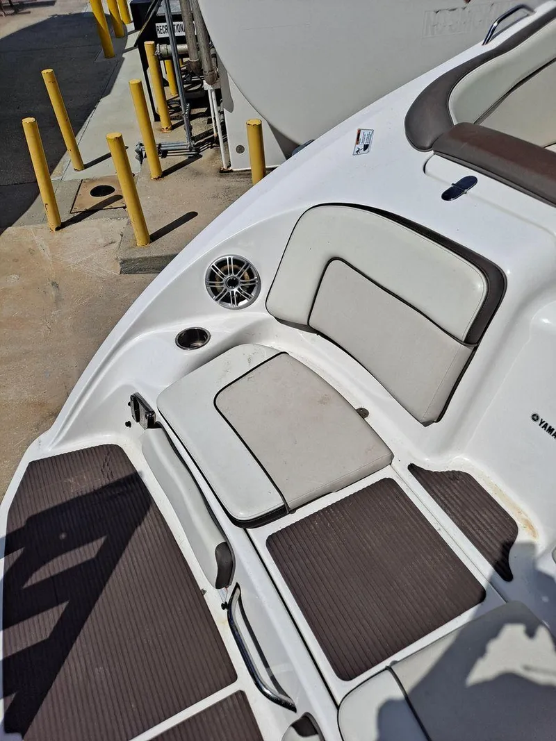 Slide: The Image of 2013 Yamaha Boats 242 Limited S interior with seating and speaker detail. - 3