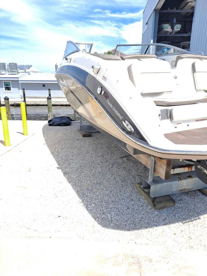 Slide: The Image of 2013 Yamaha Boats 242 Limited S on dry dock, ready for maintenance. - 33
