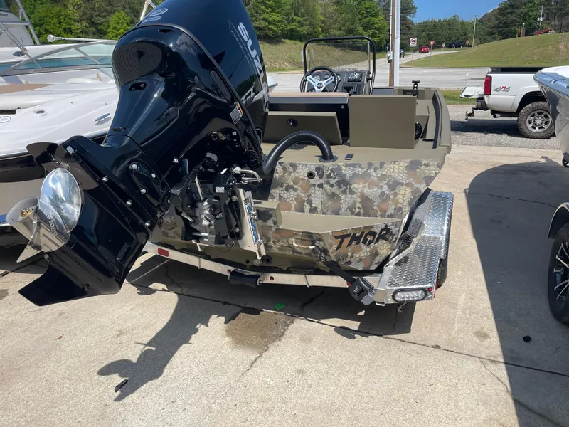 Slide: The Image of 2024 Thor 1900 Lake Hammer Center Console boat with powerful outboard motor. - 1