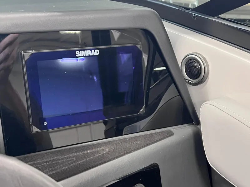 Slide: The Image of Simrad display on 2025 Harris Solstice DC 250 boat dashboard. - 15