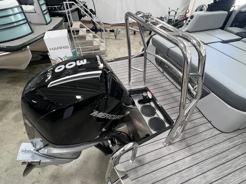 Slide: The Image of 2025 Harris Solstice DC 250 boat with Mercury 400 outboard engine, sleek design. - 24