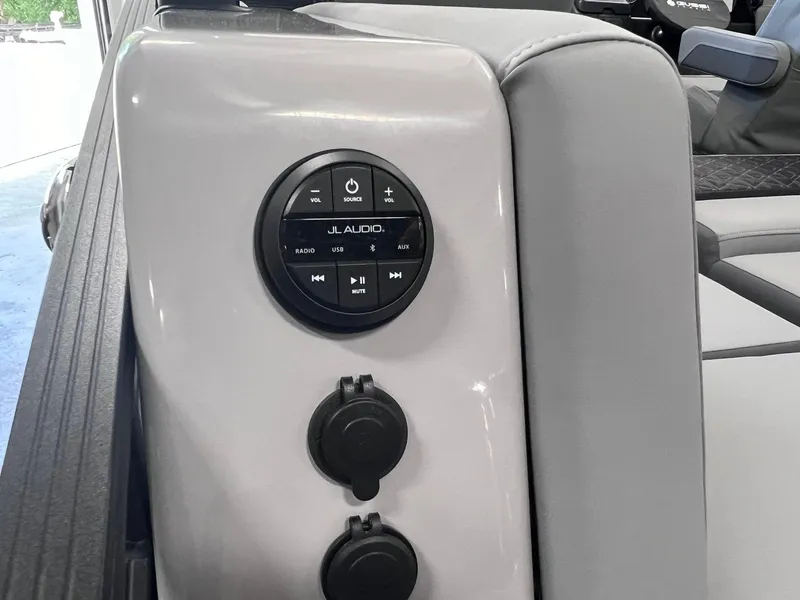 Slide: The Image of JL Audio control panel on 2025 Harris Solstice DC 250 boat interior. - 27