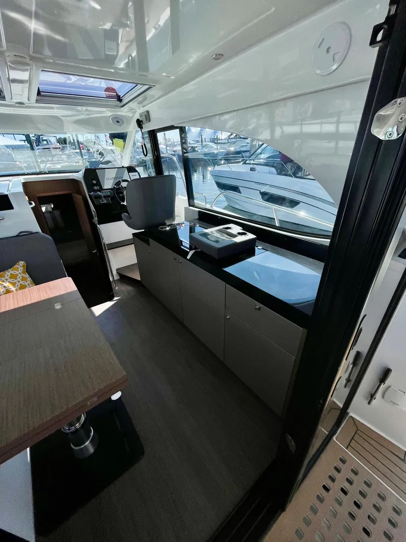 Slide: The Image of Interior of 2022 Beneteau Antares 11 yacht, featuring modern design and spacious layout. - 5