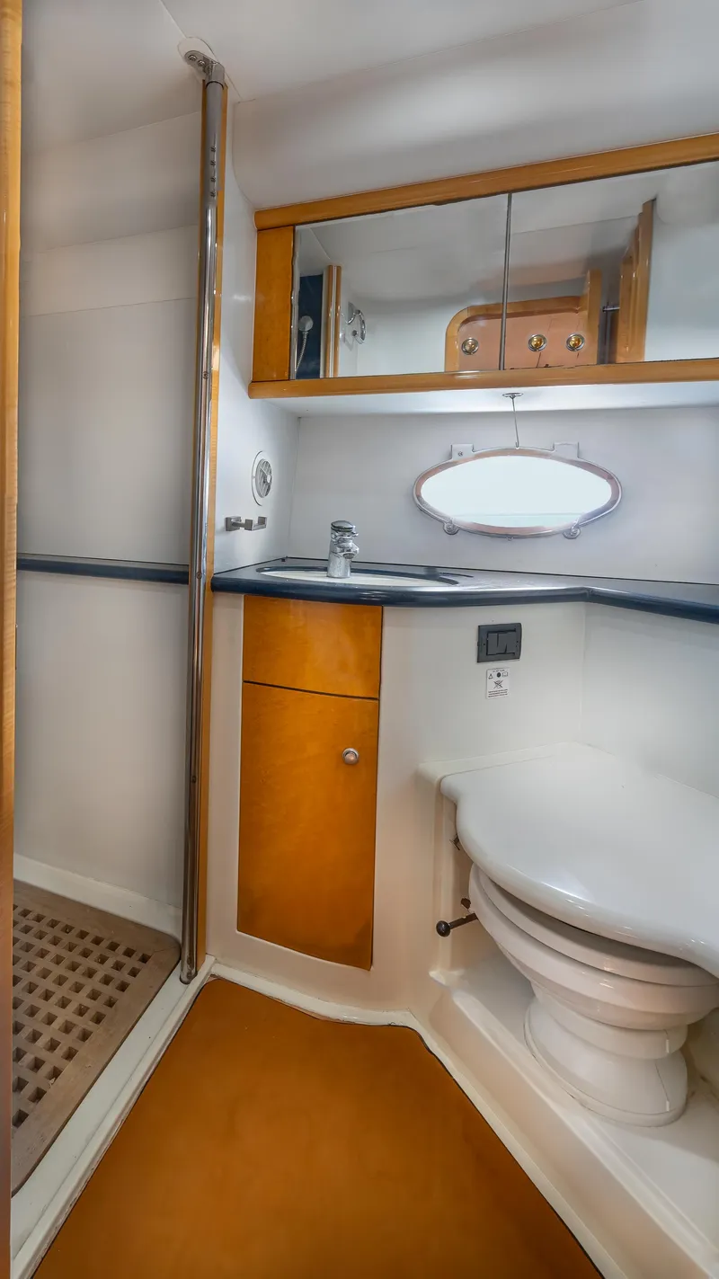 Slide: The Image of Bathroom interior of 1999 Sunseeker Predator 58 yacht with shower and toilet. - 20