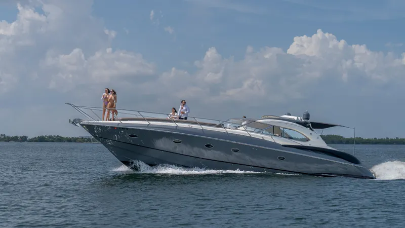 Slide: The Image of Sunseeker Predator 58 yacht cruising on open water, 1999 model. - 27