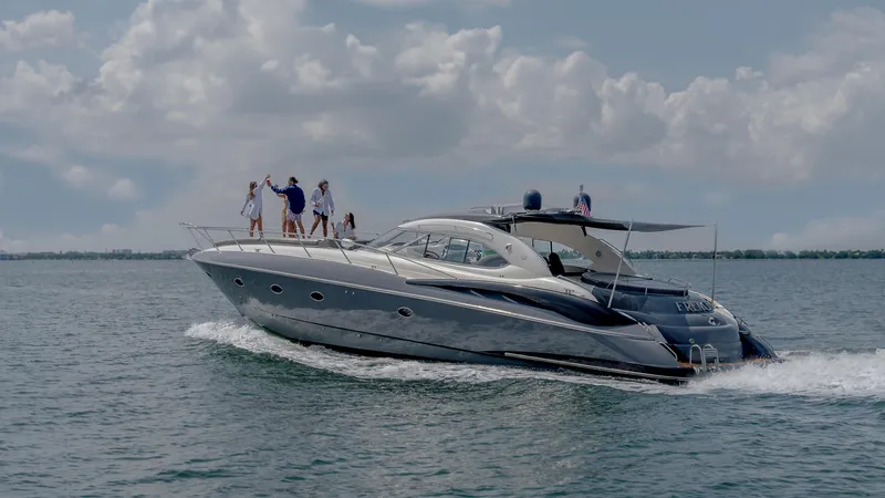 Slide: The Image of Sunseeker Predator 58 yacht cruising on open water, 1999 model. - 29