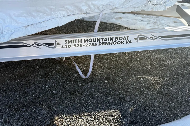 Slide: The Image of 2025 Skeeter SX221 boat trailer with Smith Mountain Boat branding, Penhook, VA. - 39