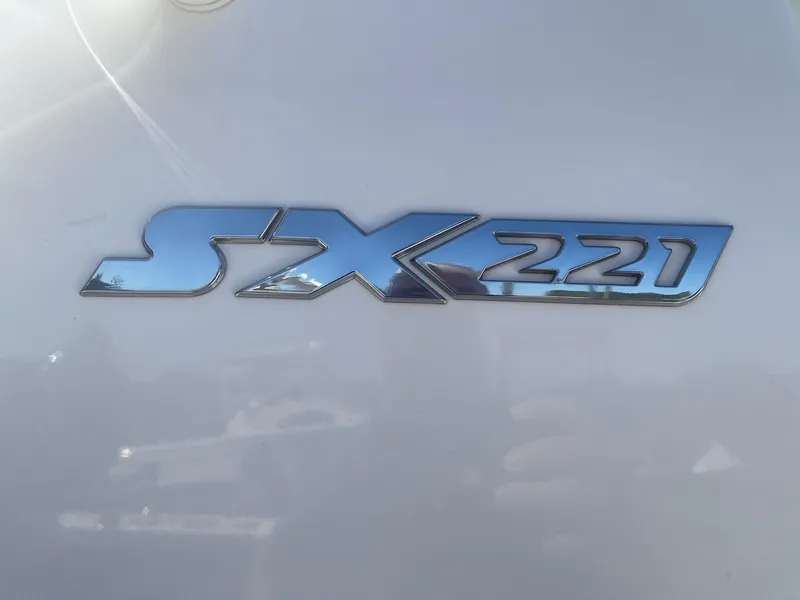 Slide: The Image of 2025 Skeeter SX221 logo on a sleek, reflective surface. - 4