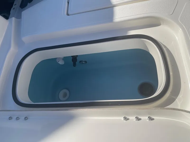 Slide: The Image of Livewell on 2025 Skeeter SX221 boat, featuring a sleek, modern design. - 8