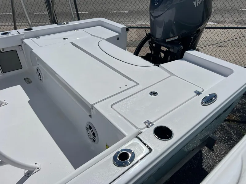 Slide: The Image of 2024 Sportsman Masters 227 Bay Boat deck with Yamaha outboard motor. - 11