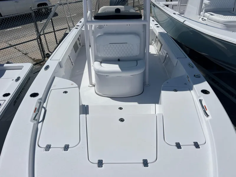 Slide: The Image of 2024 Sportsman Masters 227 Bay Boat, spacious deck, white finish, modern design. - 9