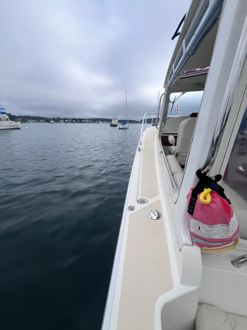 Slide: The Image of 2014 MJM 36z Downeast boat on calm water, side view. - 31