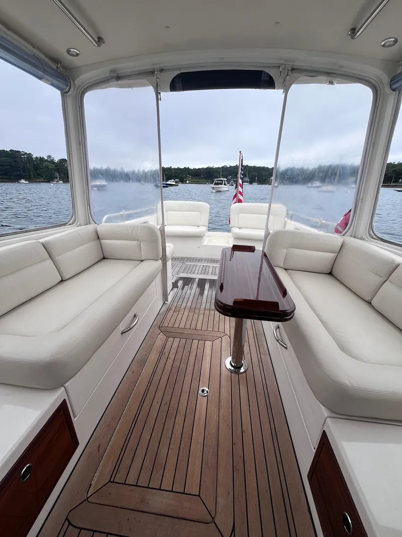 Slide: The Image of Luxurious 2014 MJM 36z Downeast yacht interior with elegant seating and wooden flooring. - 38