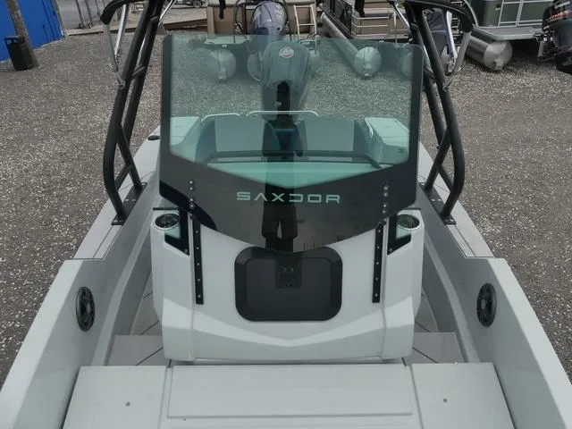 Slide: The Image of 2022 Saxdor SX 200 boat with sleek design and modern windshield. - 19