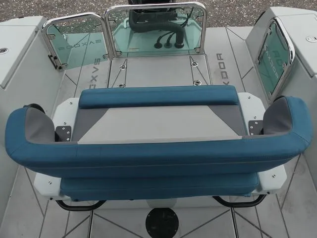 Slide: The Image of Saxdor SX 200 boat interior, 2022 model, featuring blue and gray seating. - 30