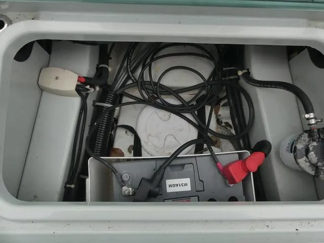Slide: The Image of Battery compartment of 2022 Saxdor SX 200 boat with cables and connections. - 34