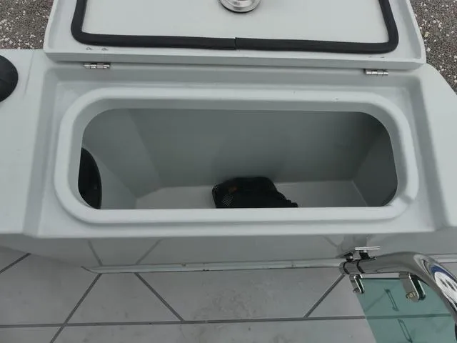 Slide: The Image of Open storage compartment on 2022 Saxdor SX 200 boat. - 35