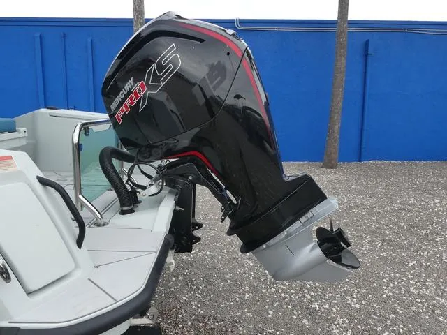 Slide: The Image of 2022 Saxdor SX 200 with Mercury Pro XS outboard motor, parked on gravel. - 39