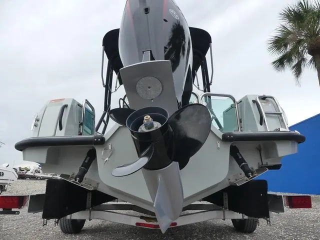 Slide: The Image of 2022 Saxdor SX 200 boat rear view with outboard motor and propeller. - 40