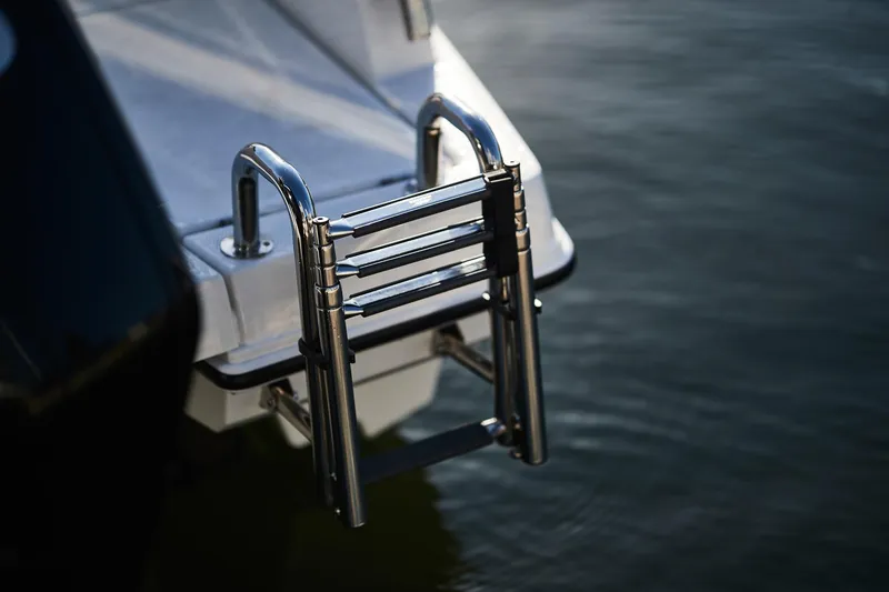 Slide: The Image of Stainless steel ladder on 2024 Skamander 920 Explorer MAX boat. - 31