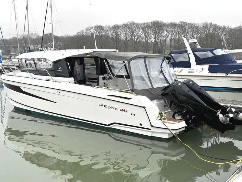 Slide: The Image of 2024 Skamander 920 Explorer MAX boat docked in marina. - 8