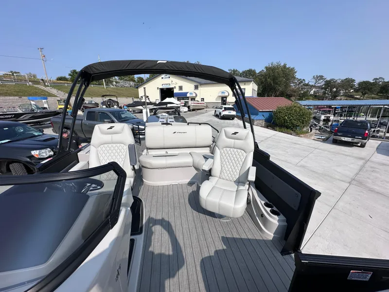 Slide: The Image of 2025 Starcraft RX 25 DL DC boat with luxurious seating and modern design. - 4