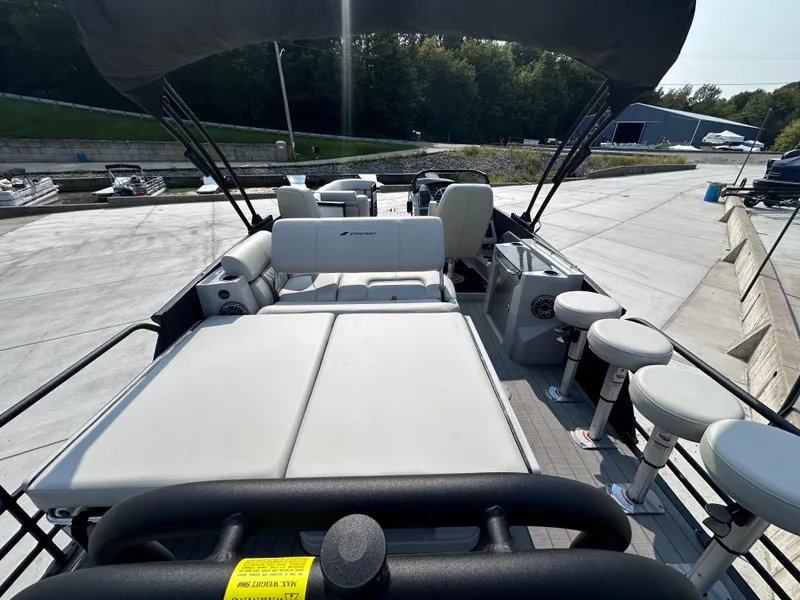 Slide: The Image of 2025 Starcraft RX 25 DL DC boat with spacious seating and modern design. - 6